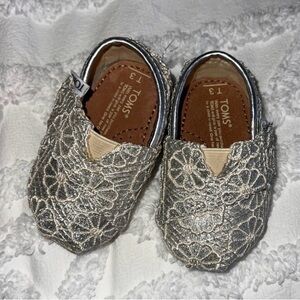 TOMS Tiny Moccasins in Shimmering Silver